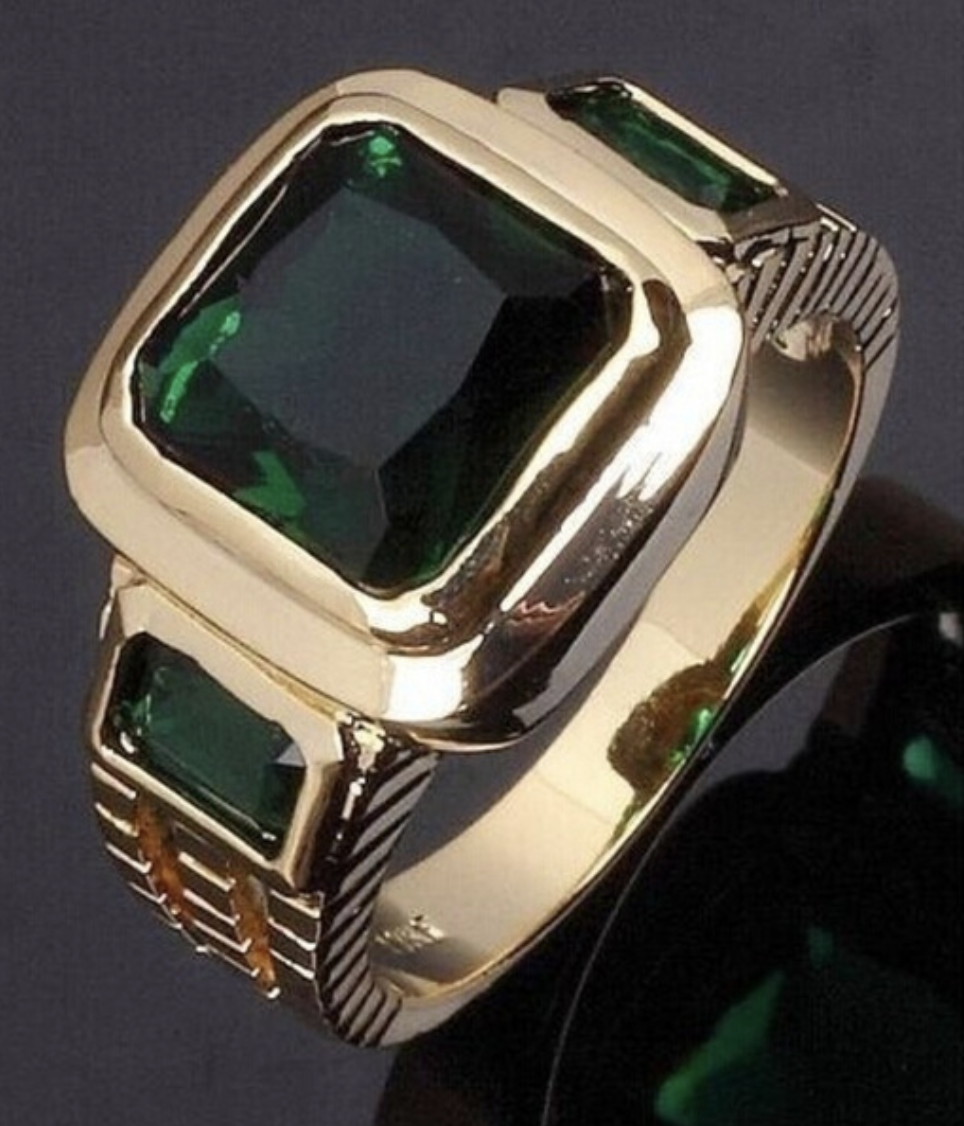 18K ring.