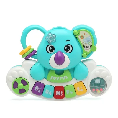 Piano infantil Kiokids em formato de coala com luzes, melodias e chocalhos.