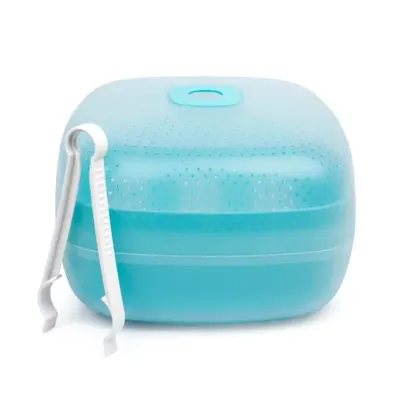 Esterilizador Suavinex de microondas com capacidade para 5 garrafas e acessórios.