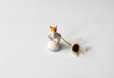 Mouse with teacup and teapot