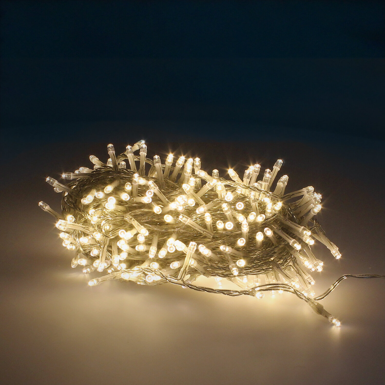 Guinalda Luces Navidad 300 Leds Color Blanco Calido. Luz Navidad Interiores y Exteriores Ip44. Cable Transparente.