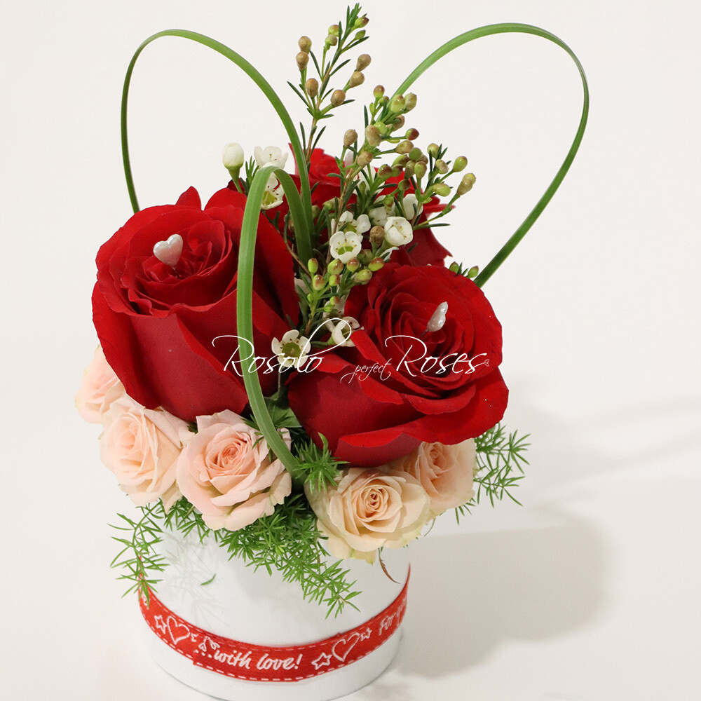 3 grandes roses rouges