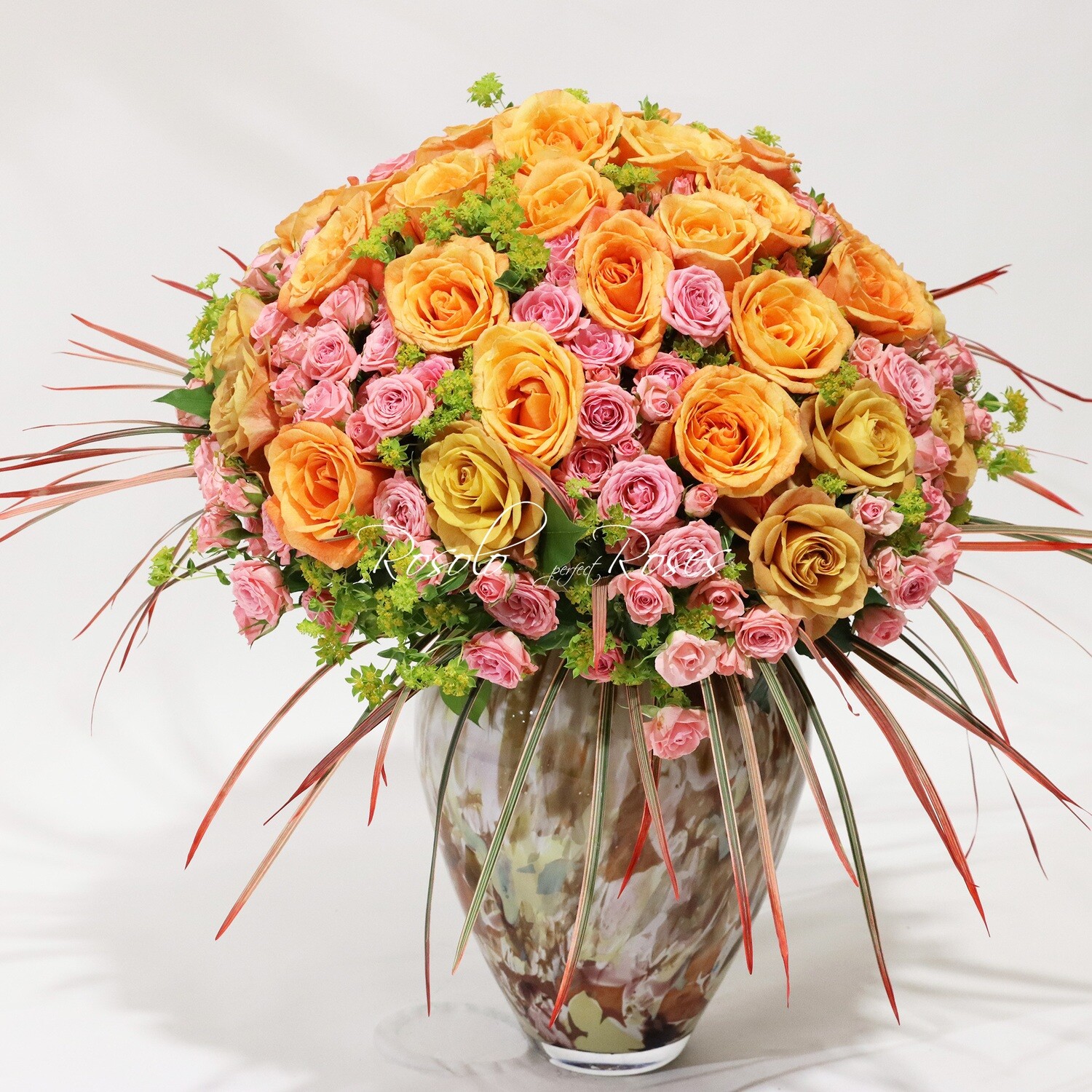 Somptueux bouquet de roses en rose et orange