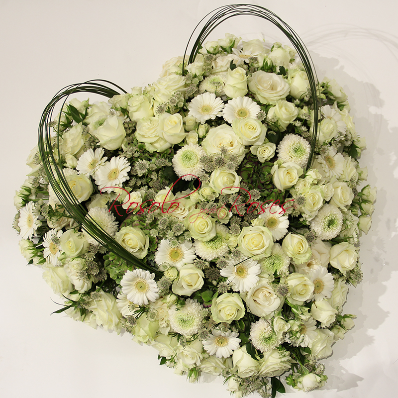 Coussin en forme de cœur en blanc et vert