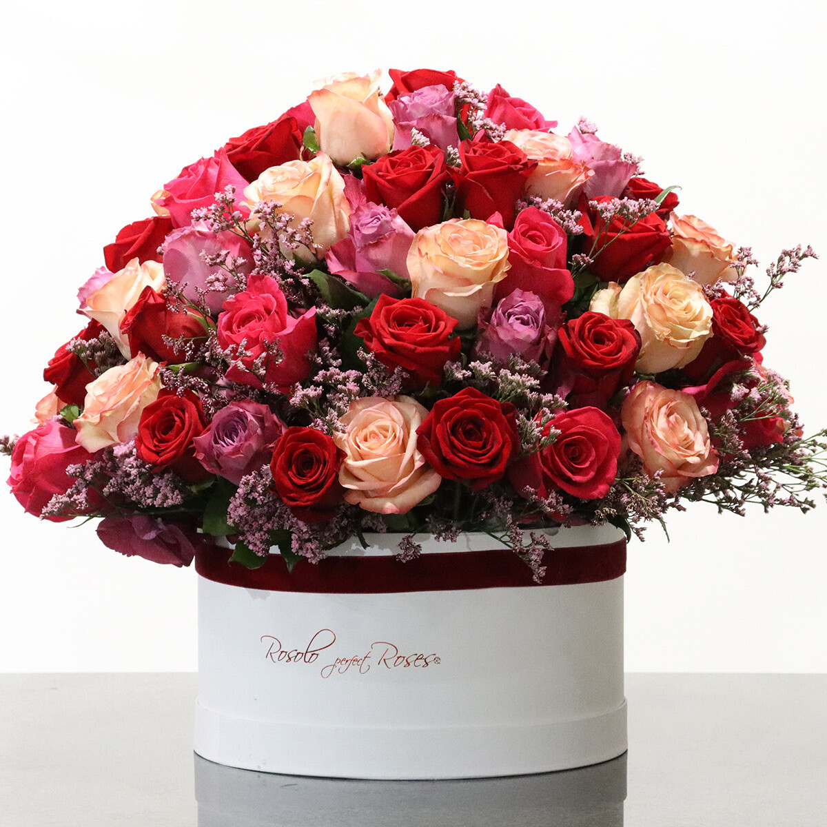 Somptueuse boite de roses couleurs rose et rouge