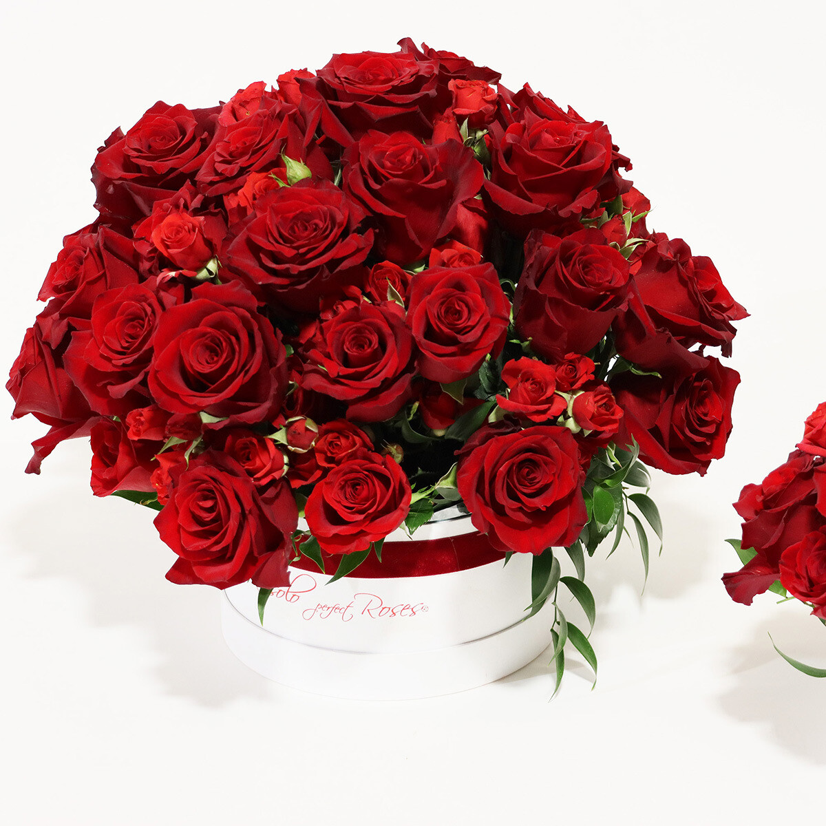 Belle composition dans une jolie boîte de roses rouges.  Plusieurs tailles.