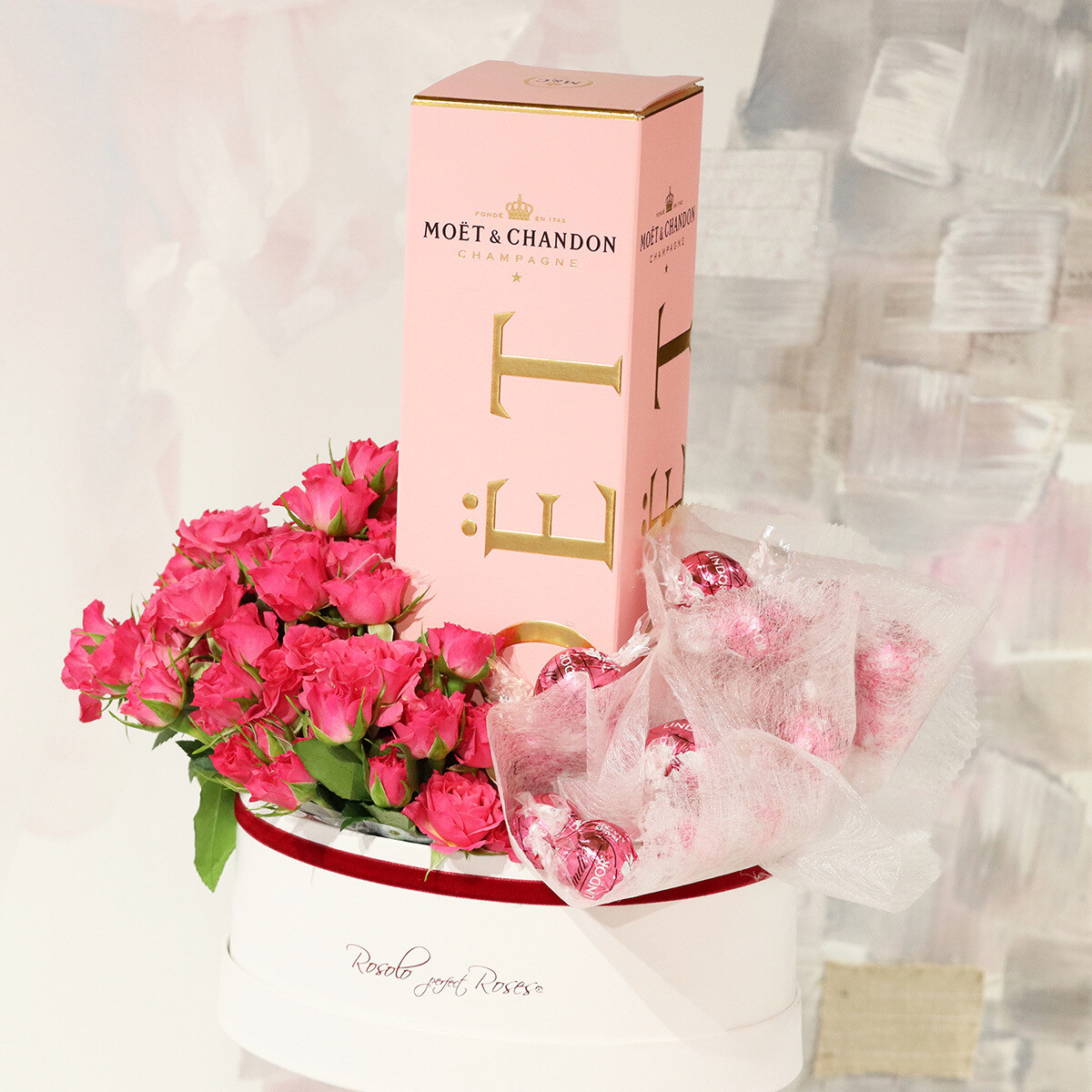 Champagne, chocolats, roses dans une belle boîte Rosolo
