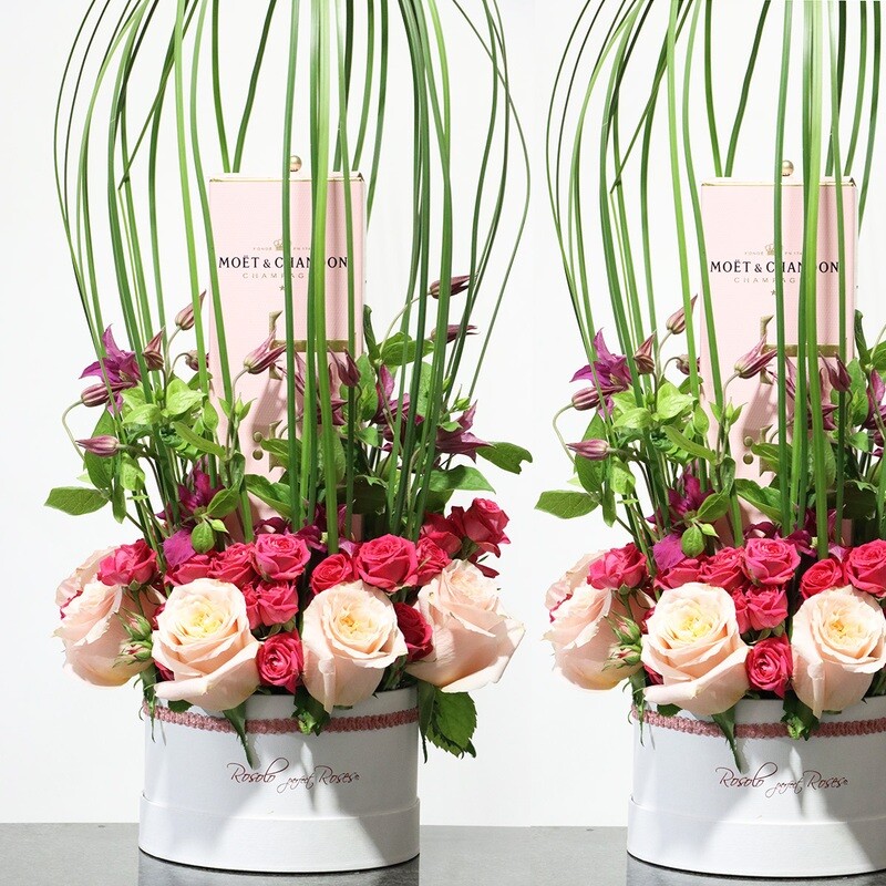Belle composition de roses et de champagne dans une jolie boîte Rosolo