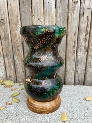 Handcrafted epoxy resin pine cone vase from Manta Wood Creations"


