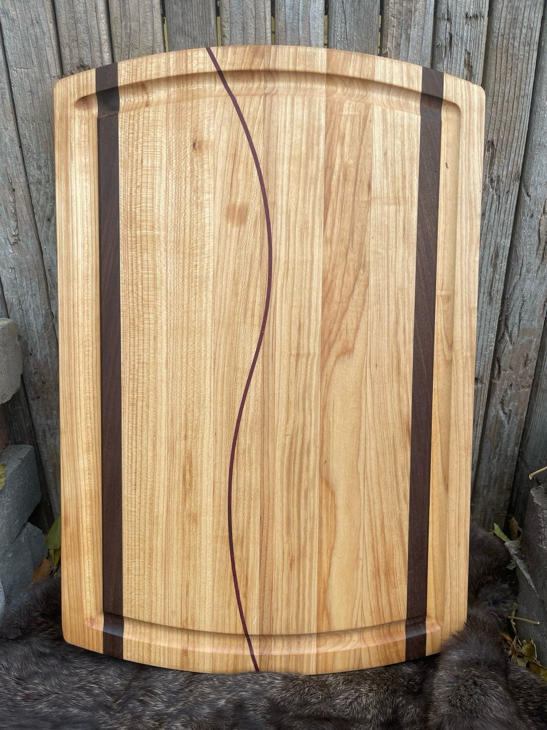 Handcrafted edge grain wooden cutting board from Manta Wood Creations

