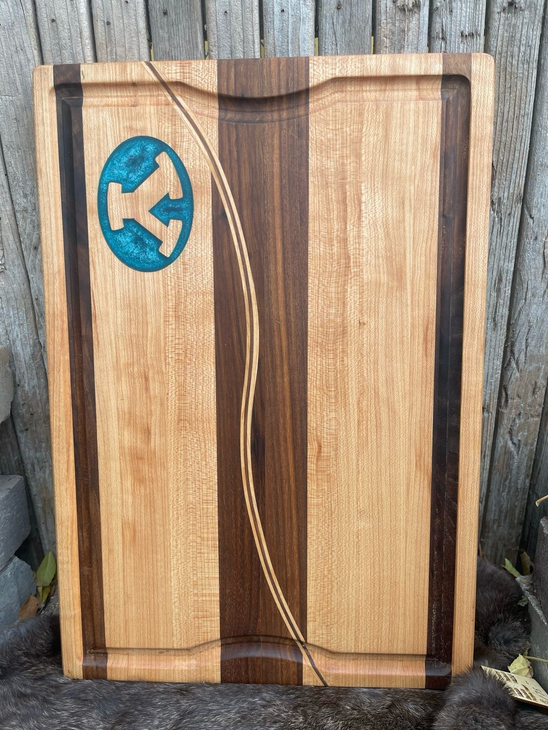 Custom inlayed handcrafted edge grain cutting board by Manta Wood Creations

