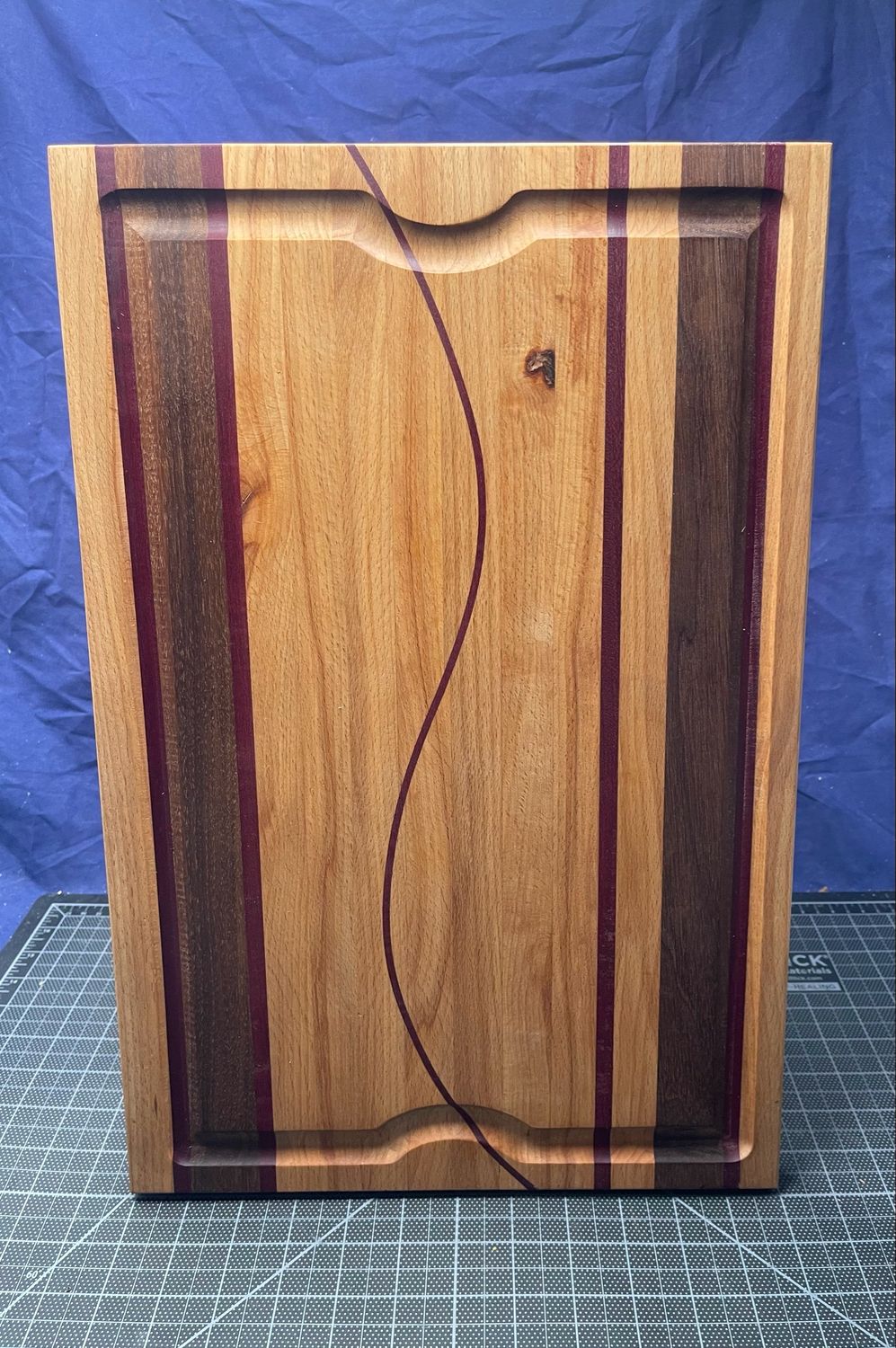 Handcrafted wooden cutting board by Manta Wood Creations

