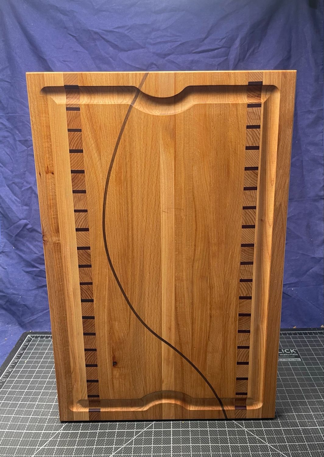 Artisan handcrafted wooden cutting board from Manta Wood Creations

