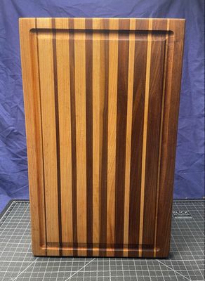 Premium handcrafted wooden cutting board by Manta Wood Creations

