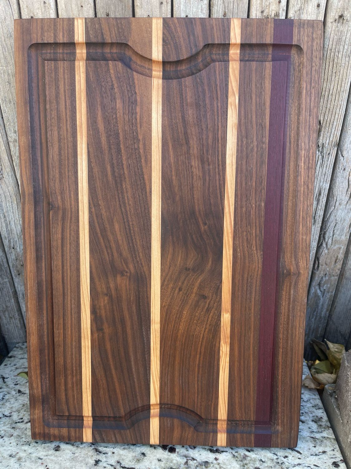 Elegant handcrafted wooden cutting board from Manta Wood Creations

