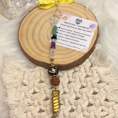 GOLD AURA QUARTZ POINT WITH RUDRAKSHA BEAD &amp; OM - Car Shield