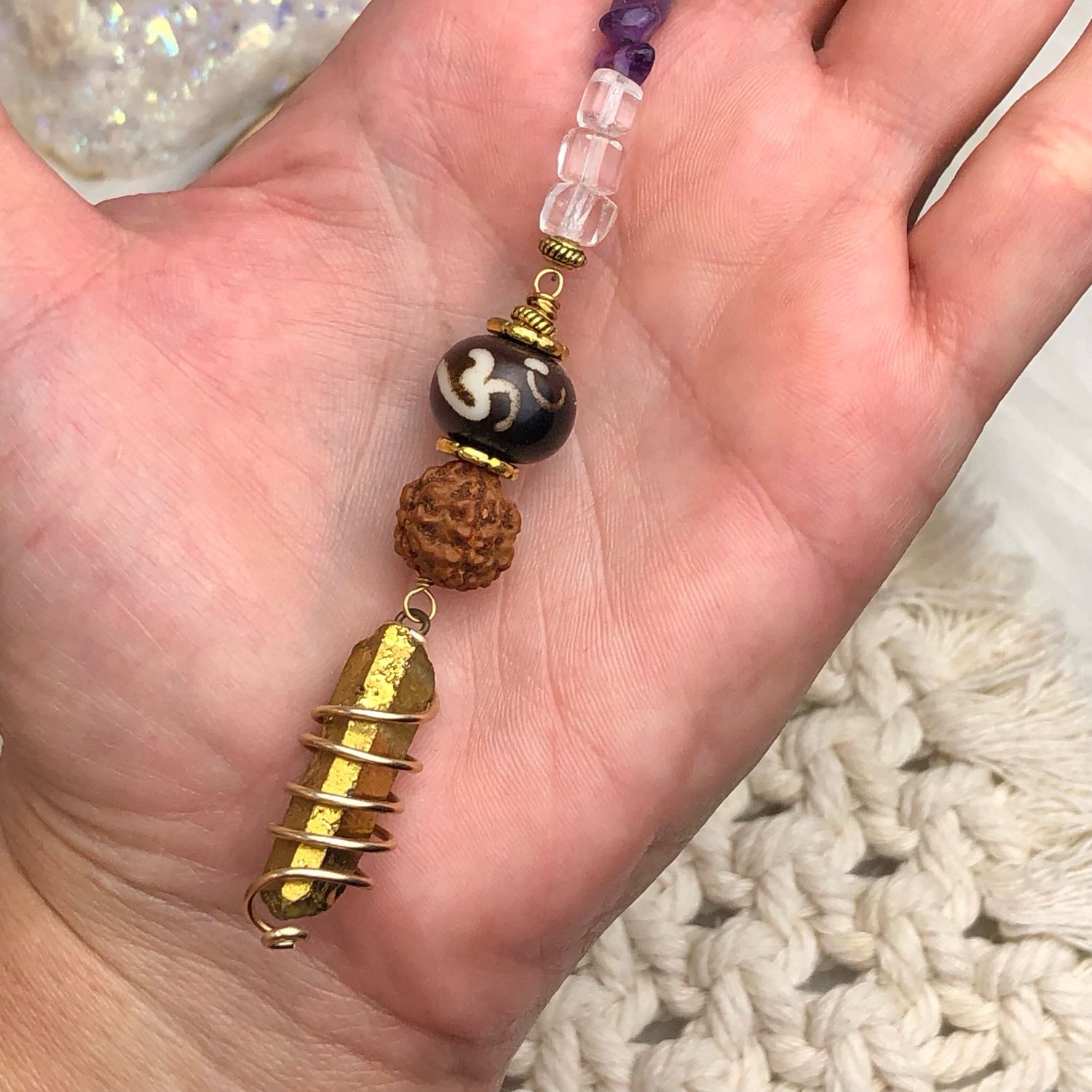 GOLD AURA QUARTZ POINT WITH RUDRAKSHA BEAD &amp; OM - Car Shield