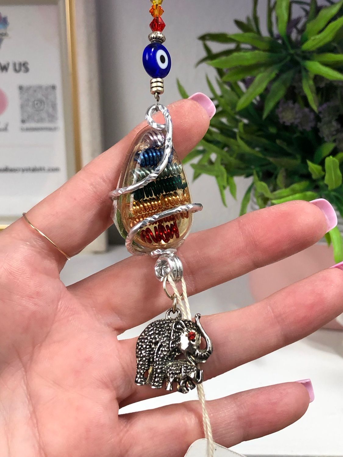 Chakra Orgonite Hanging Charm with Mother & Baby Elephant Chakra Orgonite Hanging Charm with Mother & Baby Elephant