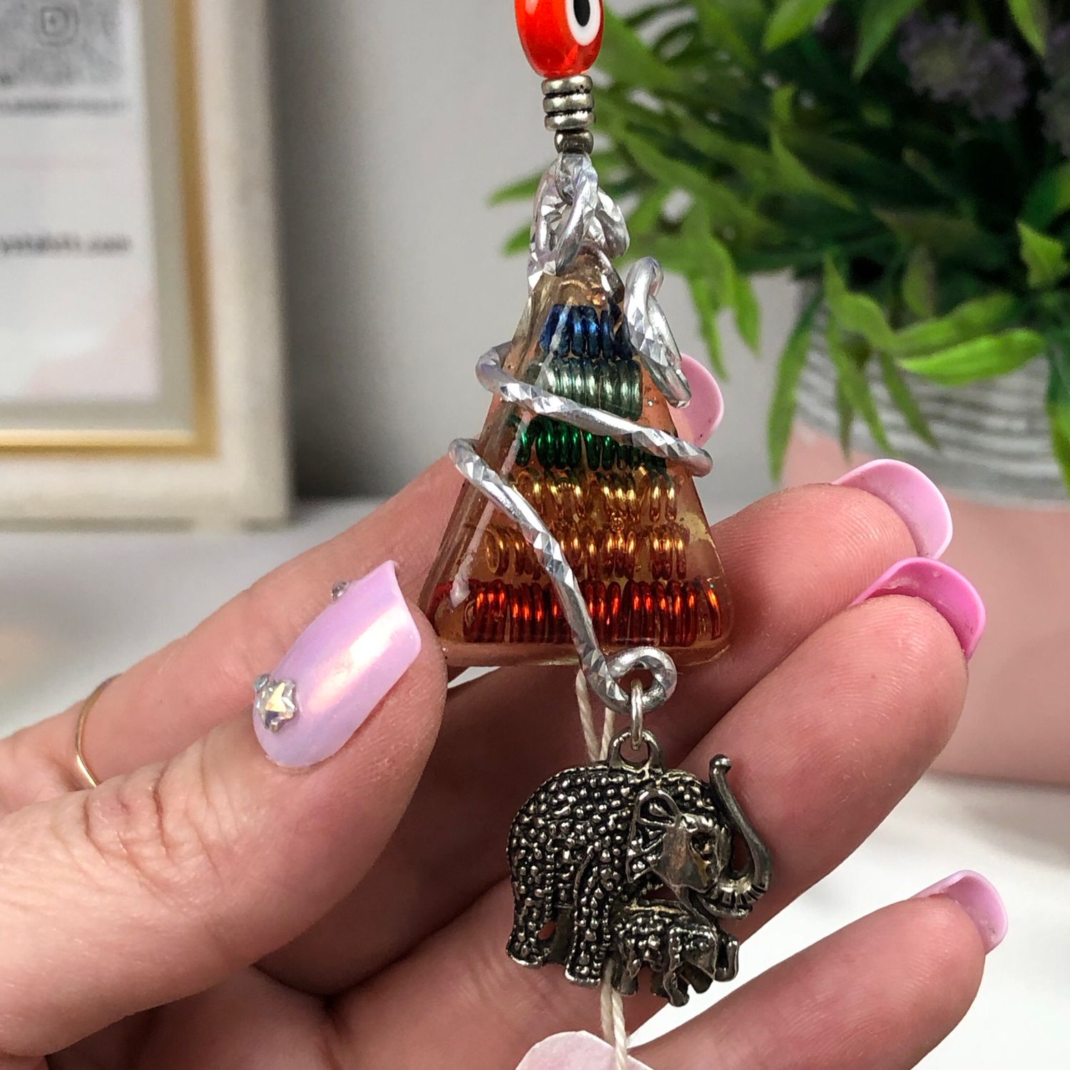 Chakra Orgonite Hanging Charm with Mother & Baby Elephant Chakra Orgonite Hanging Charm with Mother & Baby Elephant