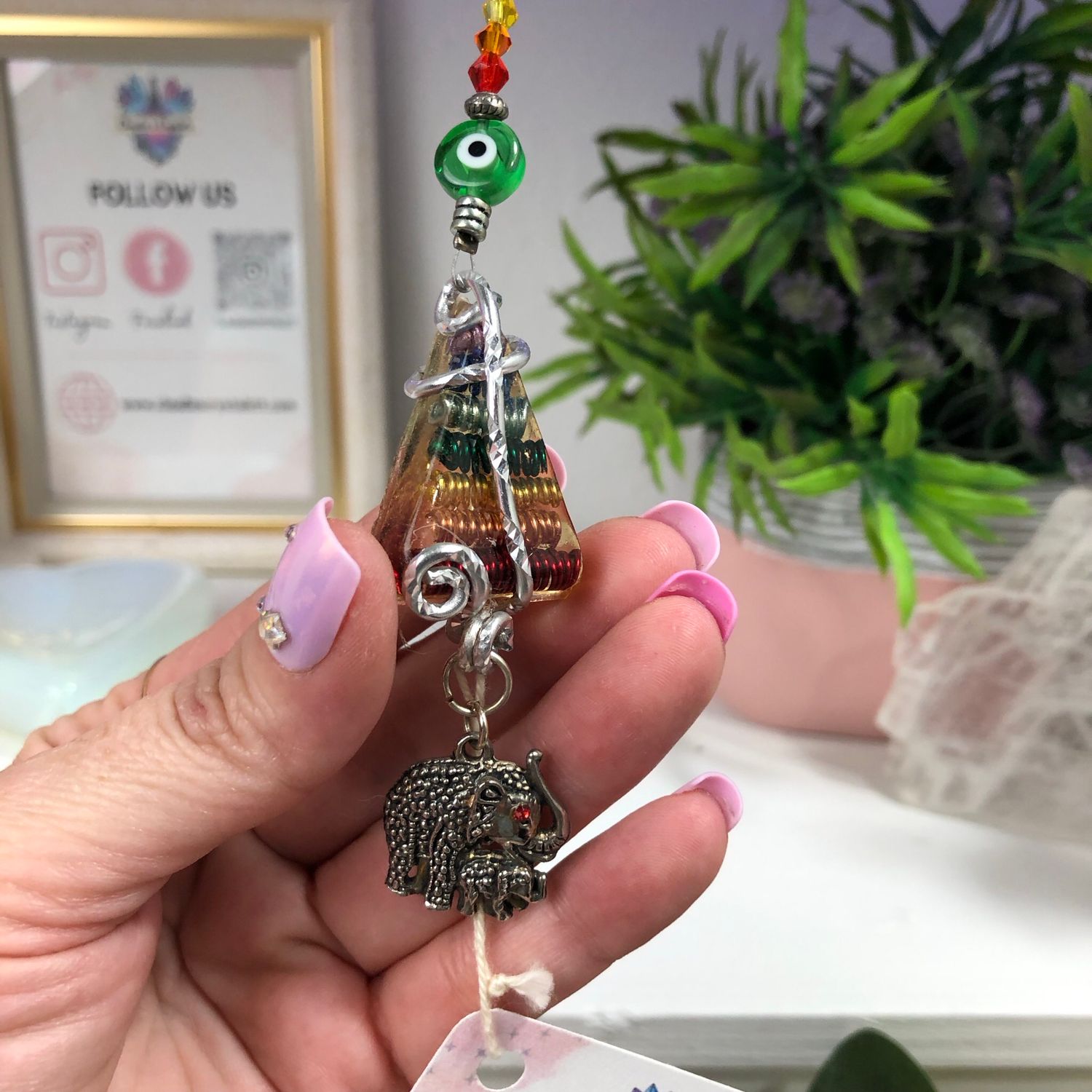 Chakra Orgonite Hanging Charm with Mother & Baby Elephant Chakra Orgonite Hanging Charm with Mother & Baby Elephant