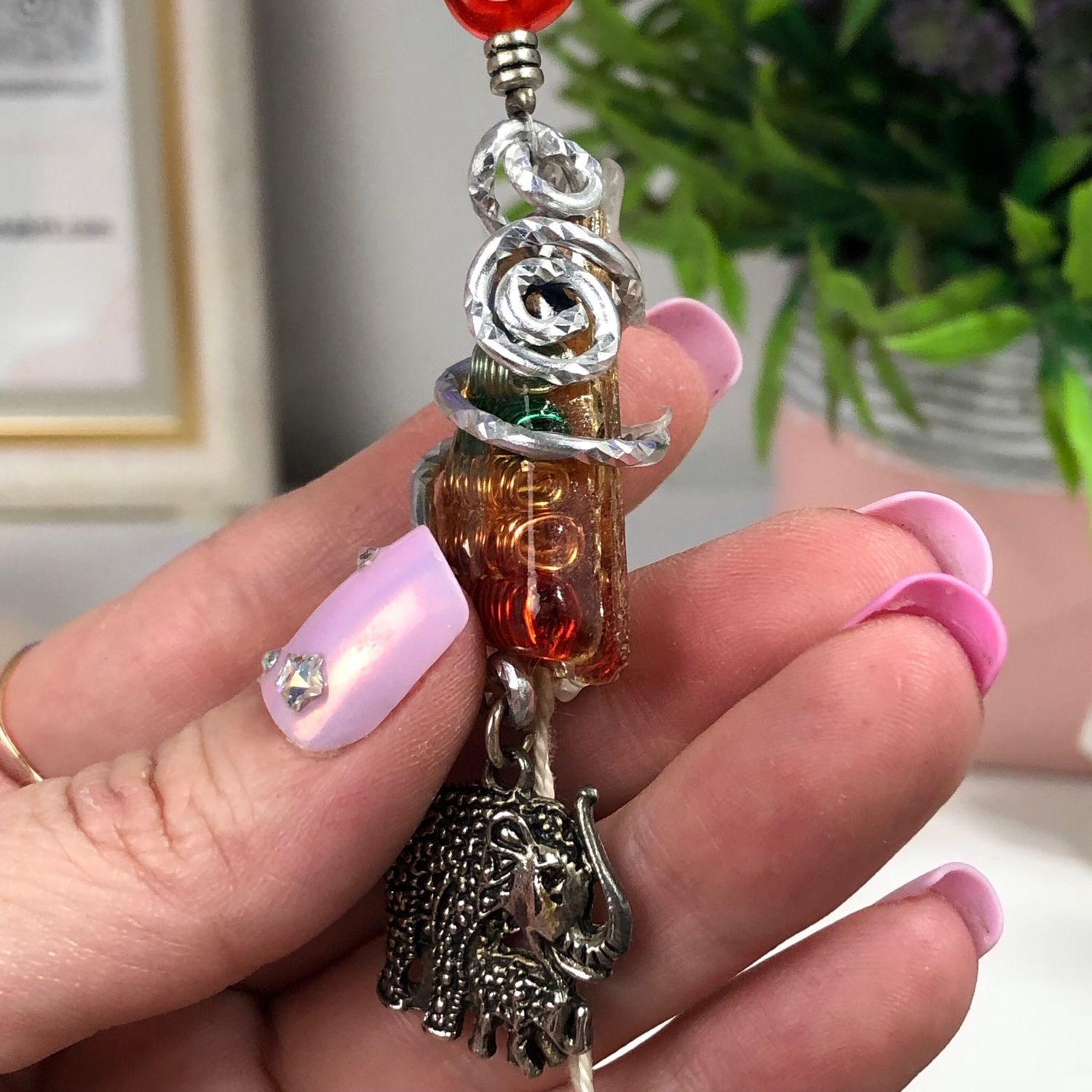 Chakra Orgonite Hanging Charm with Mother & Baby Elephant Chakra Orgonite Hanging Charm with Mother & Baby Elephant