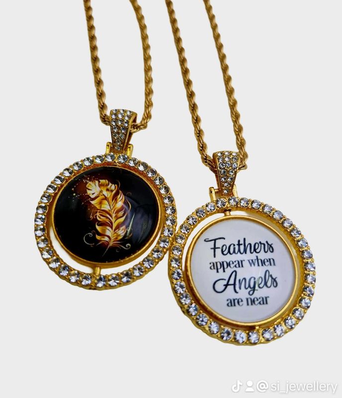 Gold Feather Rhinestone Rotation Pendant