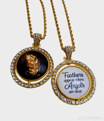 Gold Feather Rhinestone Rotation Pendant Gold Feather Rhinestone Rotation Pendant