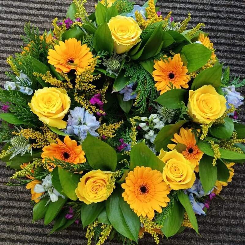 Florist Choice
Yellow Round Wreath : From £55.00