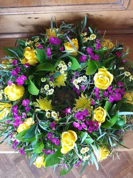 Florist Choice
Purple and Yellow Country Flowers Round Wreath : From £55.00