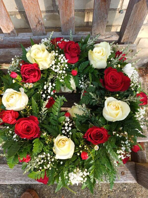 Florist Choice
Red and White Rose  Round Wreath : From £55.00