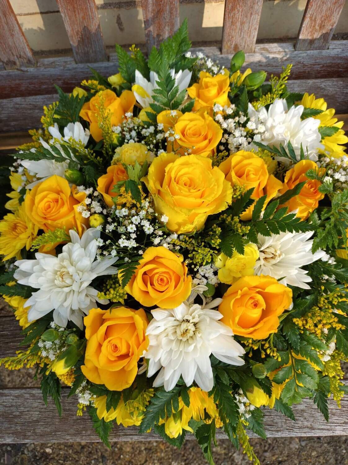 Peterborough Funeral Flowers
Yellow and White  Posy Pad   : From £55.00