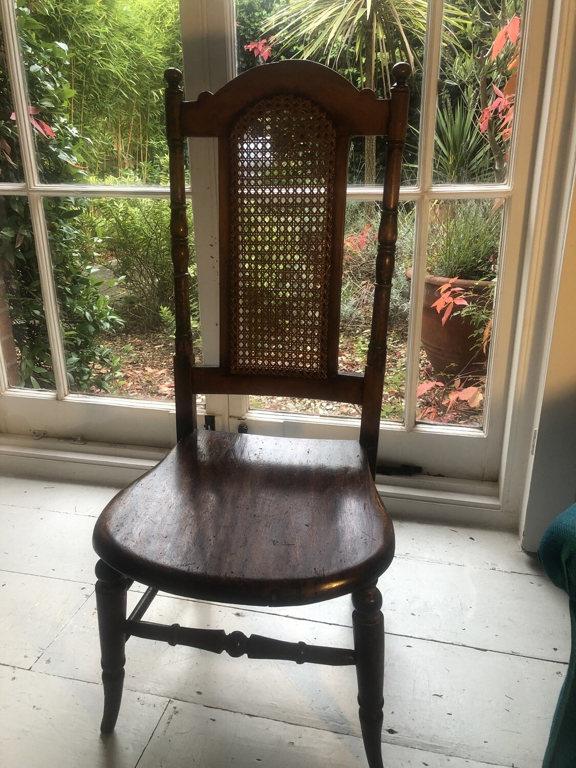 Pretty antique high back low seat chair