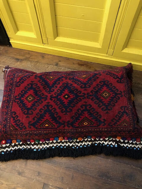 beautiful cushion made with antique kilim and intricate fringe
