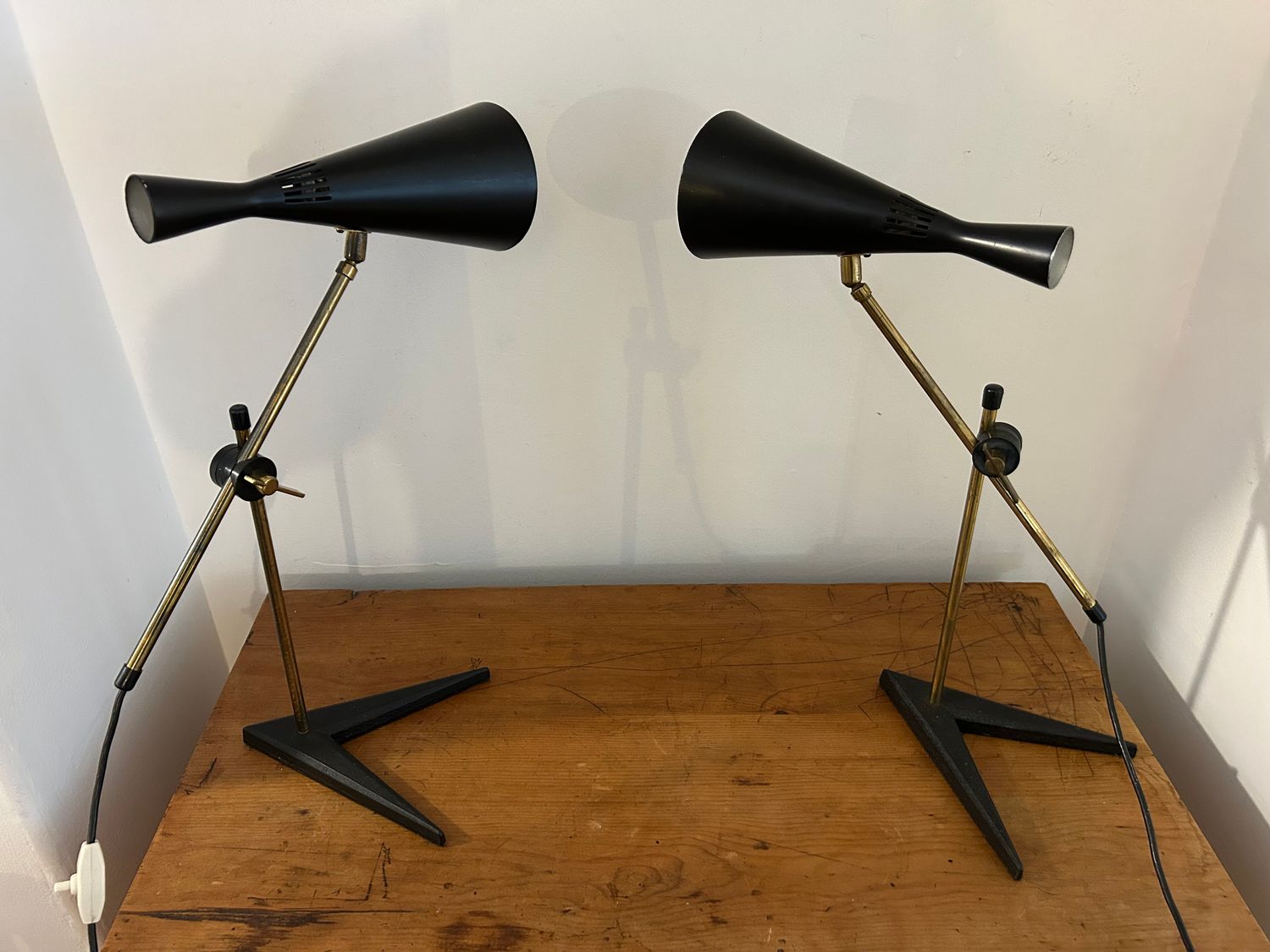 a rare pair of black of G A Scott desk lamps