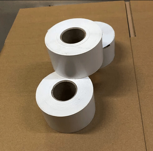 Plain white 50 rolls linerless / continuous thermal labels 58mm wide x 65mts, top coated with chill adhesive