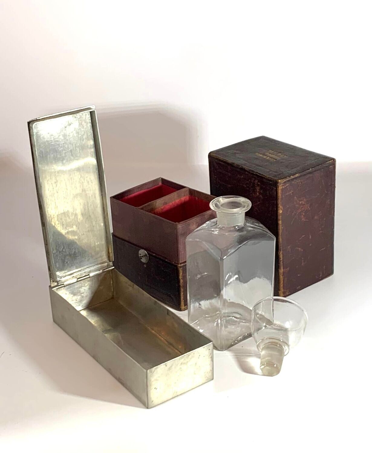 19thC Red Leather Clad Railway Companion with Decanter, Cup & Sandwich Tin.