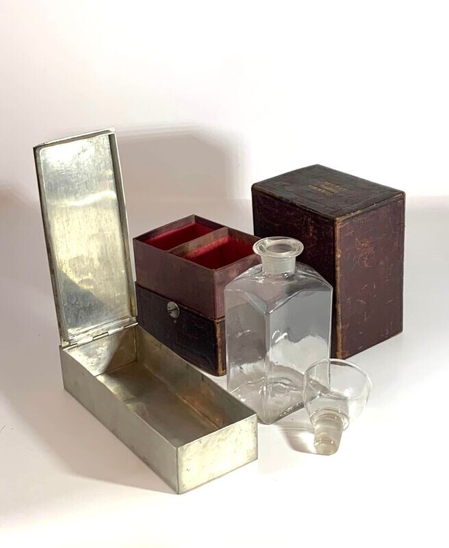 19thC Red Leather Clad Railway Companion with Decanter, Cup & Sandwich Tin.