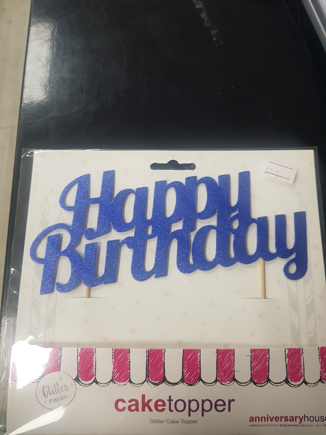 Glitter cake topper in blue