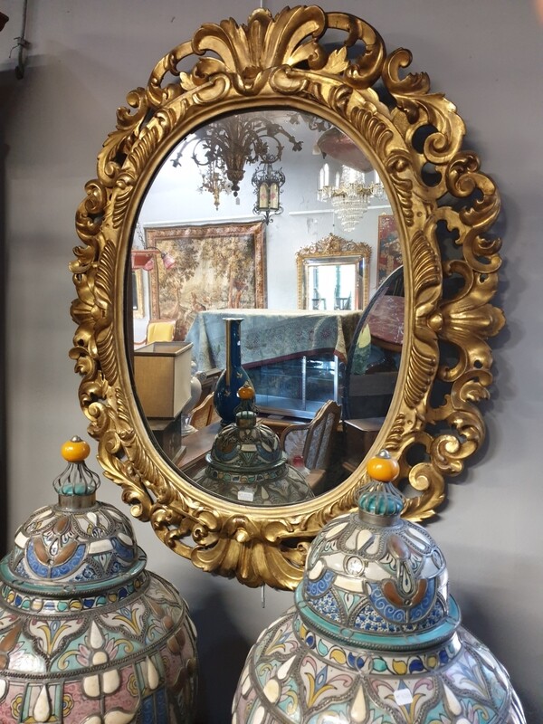 Grand miroir ovale doré