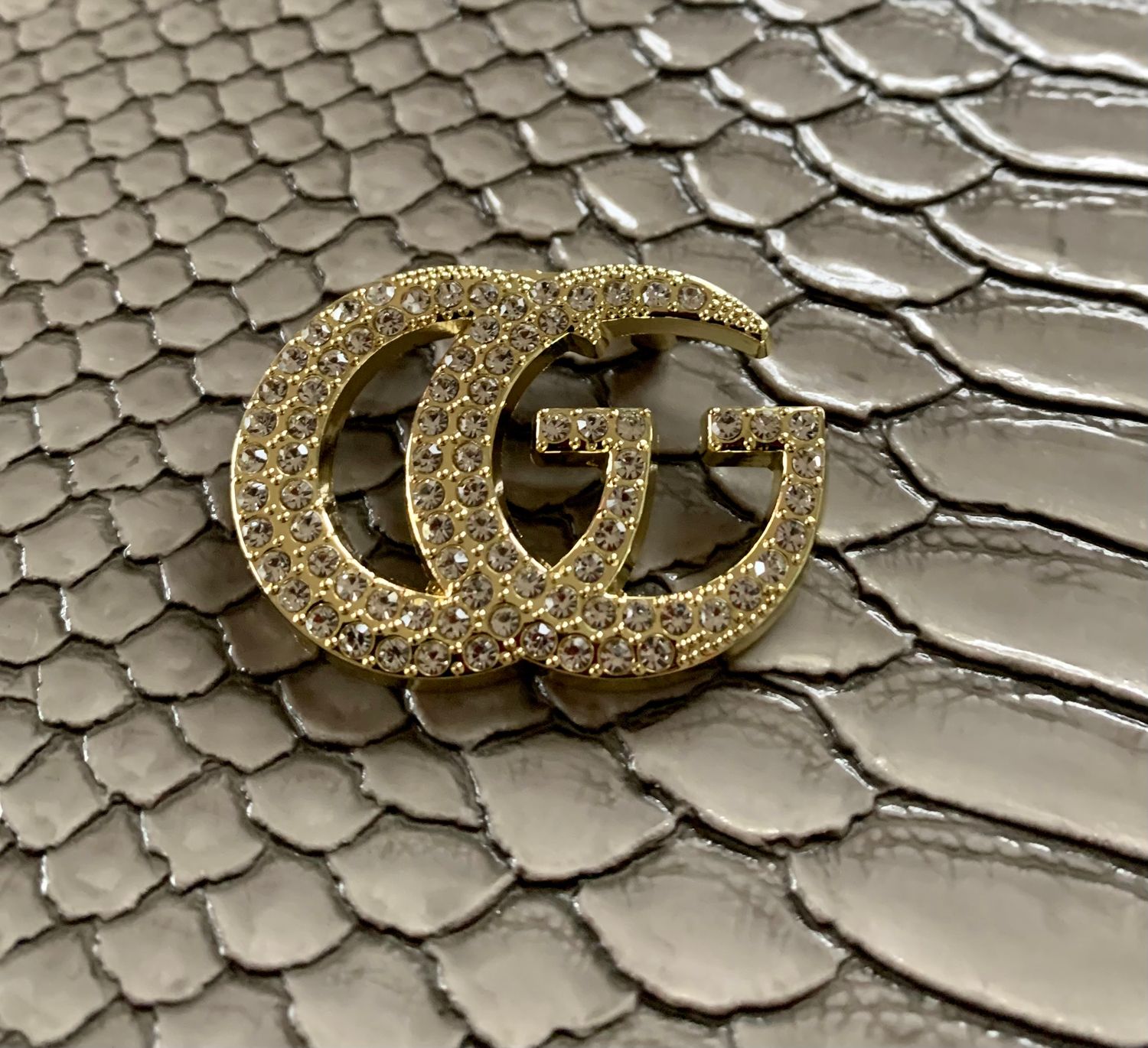 G brooches