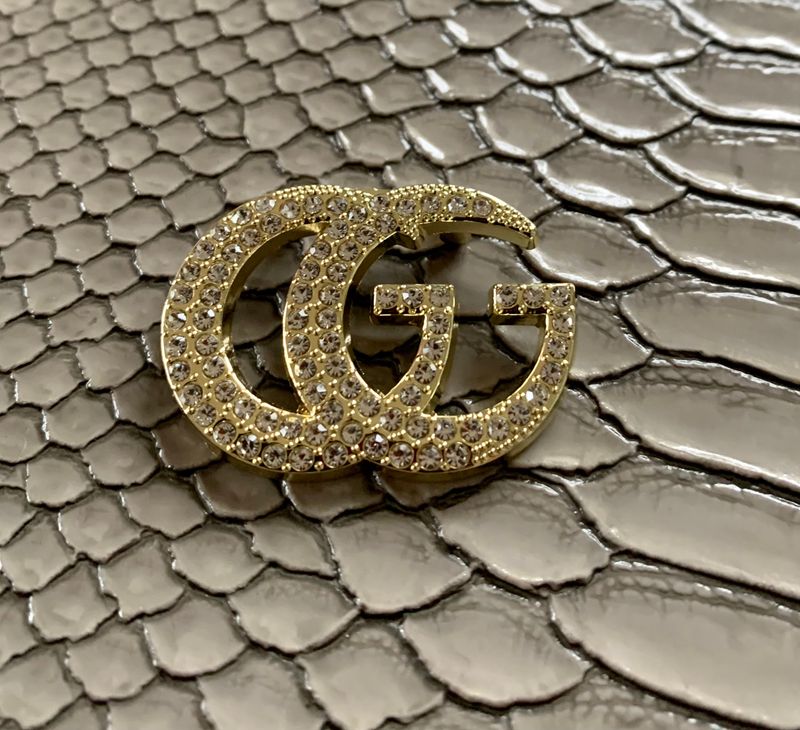 G brooches