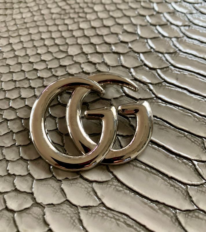G brooch