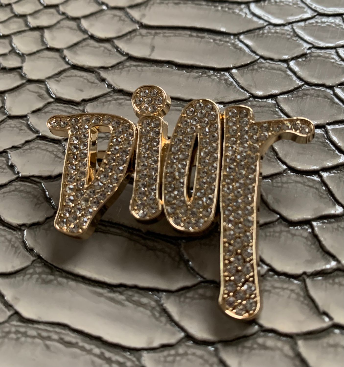 D brooch