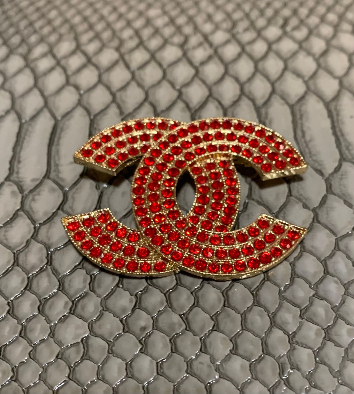 Red brooch
