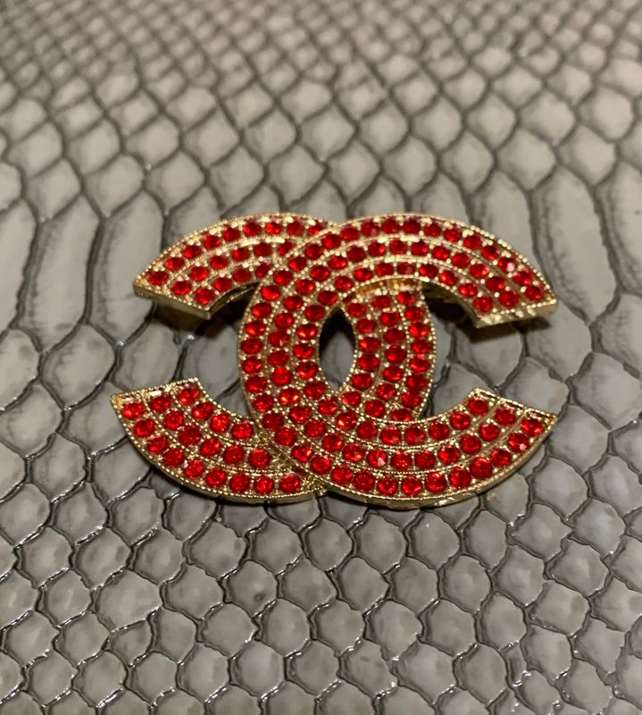 Red brooch