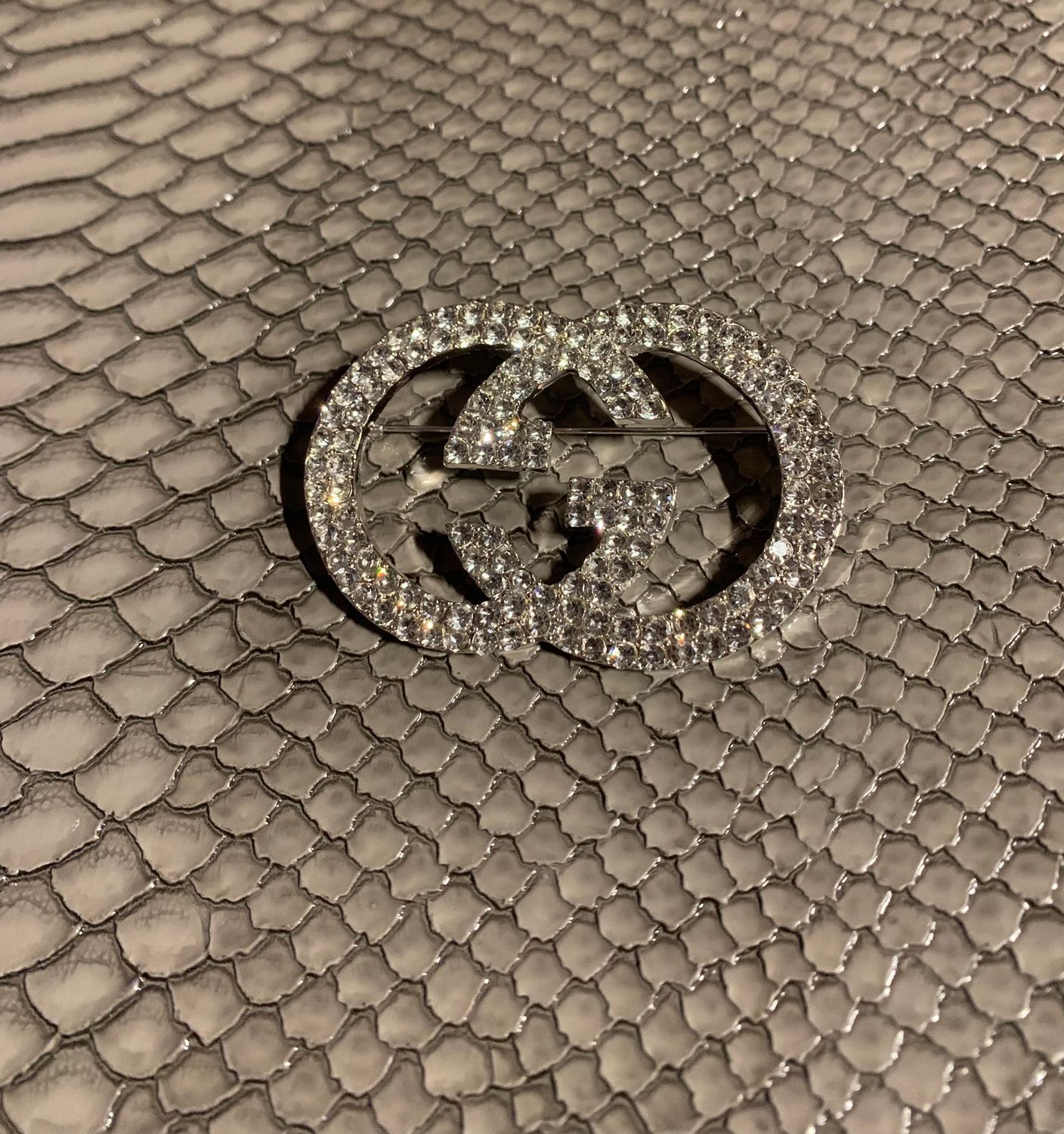 G bling brooch