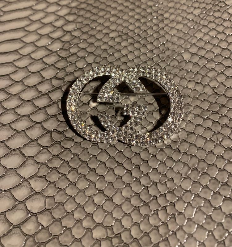 G bling brooch