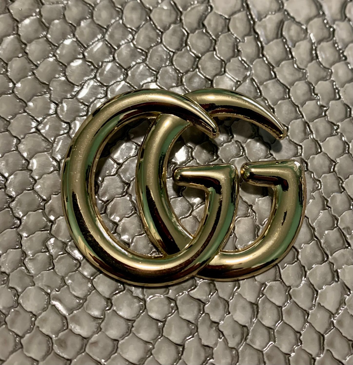 G brooch