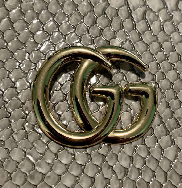 G brooch