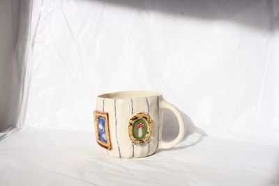 Picture Frames Mug with stripey wallpaper